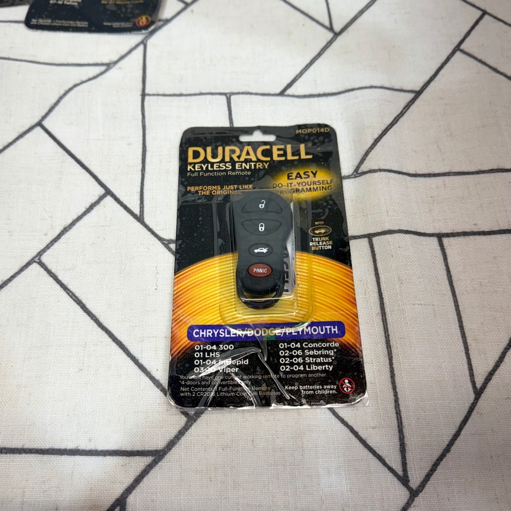 Duracell Keyless Entry Remote MOP014D Black 4-Button Chrysler Dodge Plymouth